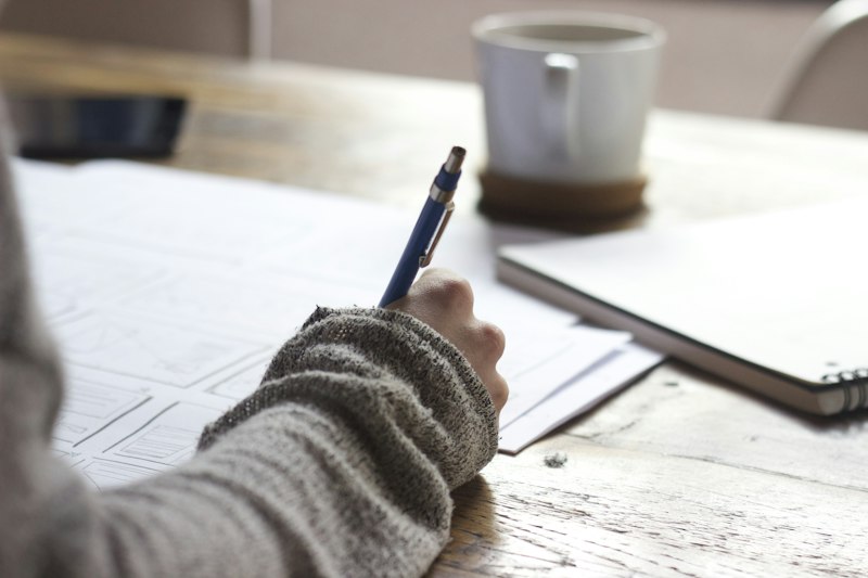 Student writing notes checklist
